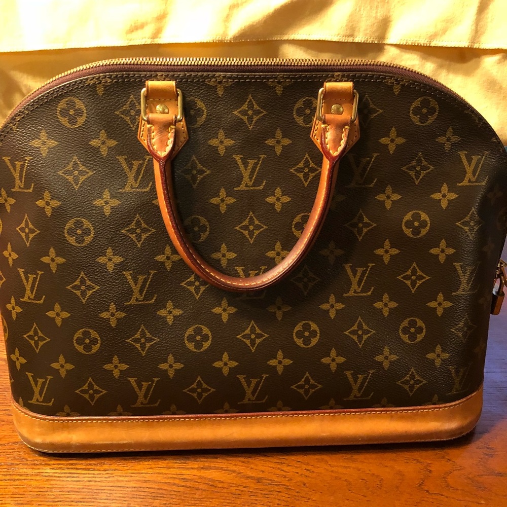 Authentic Louis Vuitton Alma Purse